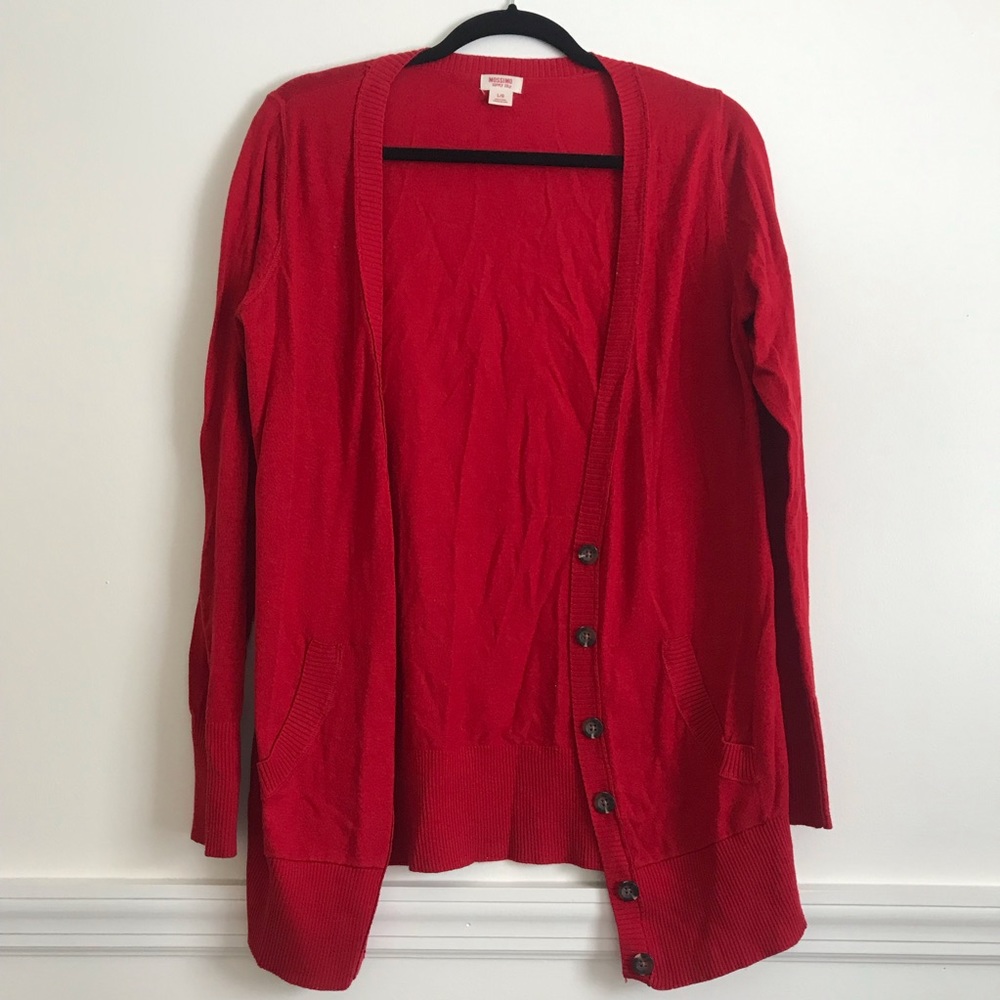 Red button up cardigan.